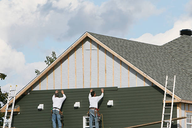 Professional Siding Installation technician working in Bloomfield, NY
